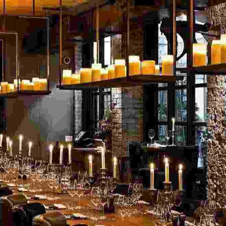 hanging shelves with candles above tables