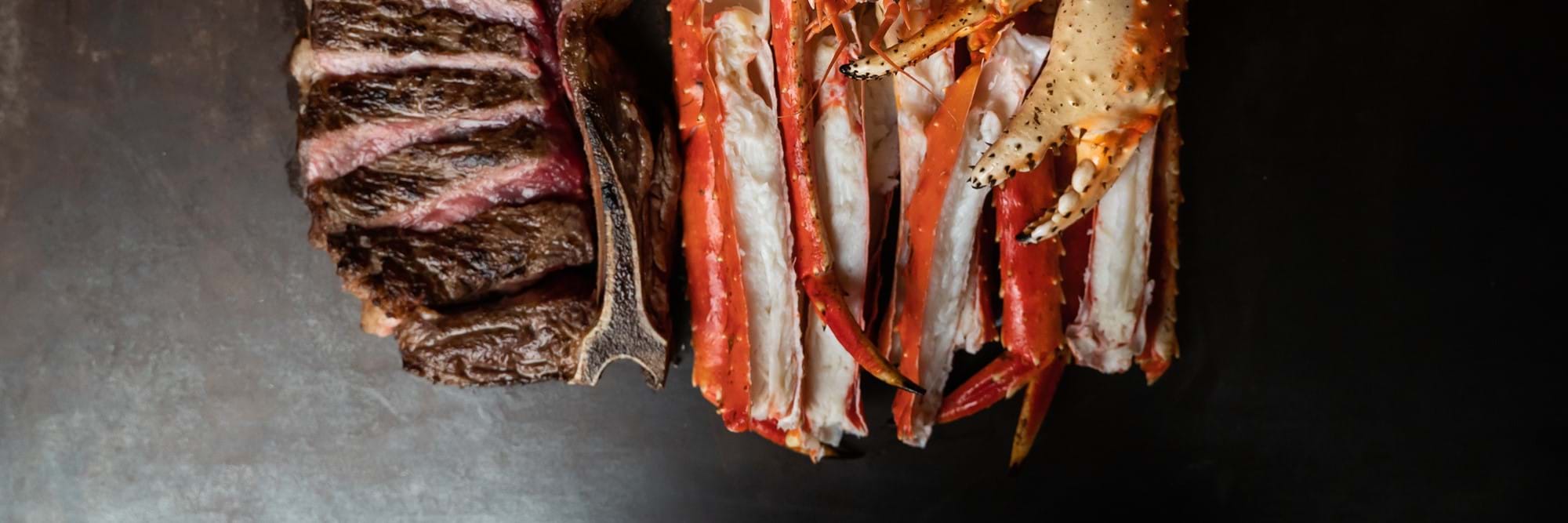 cooked crab and steak