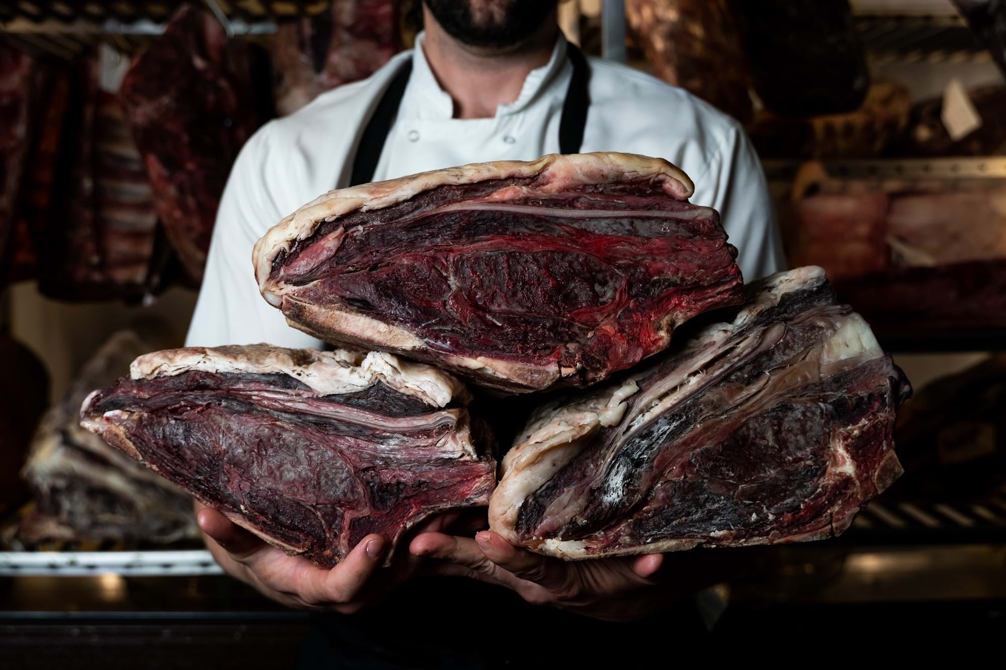 chef holding meat