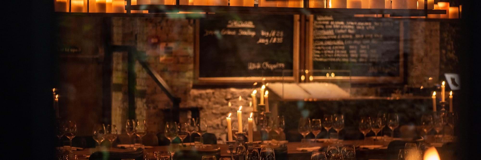 laid table with candles lit