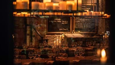 laid table with candles lit