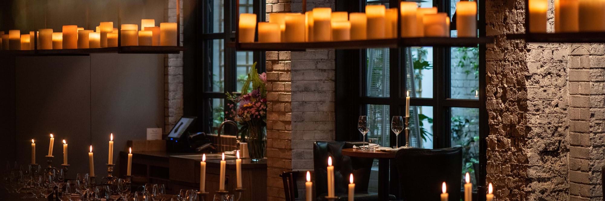 table laid with candles lit