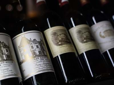 row of red wine bottles