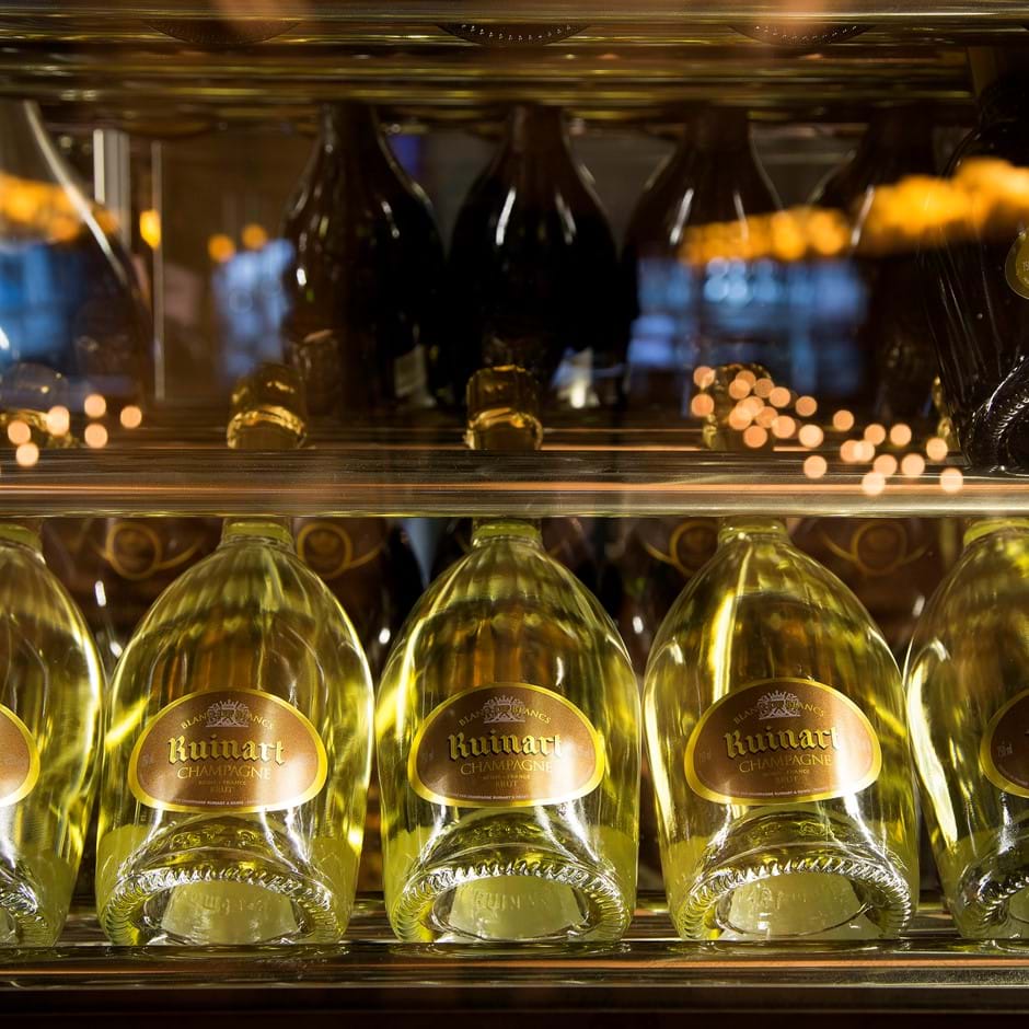 row of champagne bottles